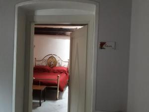 Postel nebo postele na pokoji v ubytování B&B Villa Tonelli