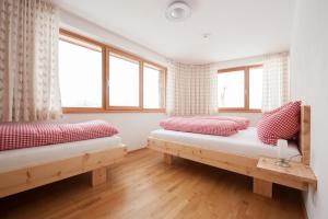 Ein Bett oder Betten in einem Zimmer der Unterkunft Martinshof