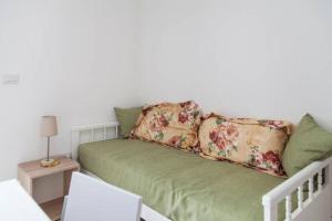 A bed or beds in a room at Stella del Mare