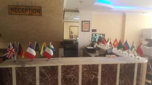 a table with flags on it in a room at Florin Hotel in Istanbul