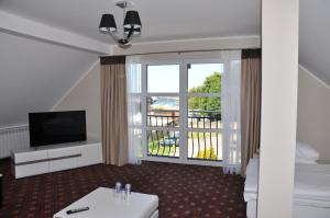 TV a/nebo společenská místnost v ubytování Hotel Morze