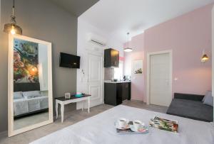 TV a/nebo společenská místnost v ubytování Venice Deluxe Studios