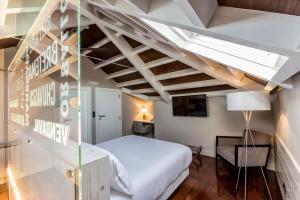 Posteľ alebo postele v izbe v ubytovaní Hotel O Semaforo
