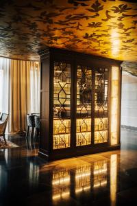 a room with a glass wall with a ceiling at Hotel Bagués, a Small Luxury Hotel of the World in Barcelona