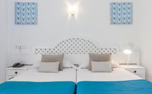 Posteľ alebo postele v izbe v ubytovaní BLUESEA Costa Verde