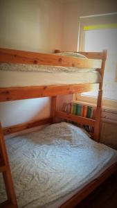 Ένα ή περισσότερα κρεβάτια σε δωμάτιο στο Ośrodek Wczasowy Belona - BON TURYSTYCZNY