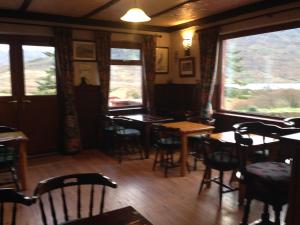En restaurant eller et spisested på Kylemore Pass Hotel
