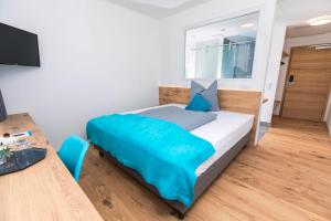 Postel nebo postele na pokoji v ubytování motel isar | 24h/7 checkin