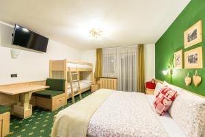 Postel nebo postele na pokoji v ubytování Alpstyle Hotel Albolina Wellness & Beauty