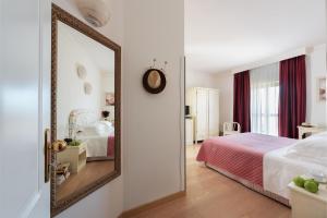 Voodi või voodid majutusasutuse Hotel Corsignano toas