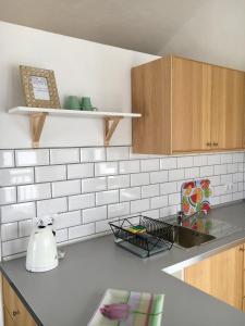 Kuchyň nebo kuchyňský kout v ubytování Studio Luna + 16 fotografií