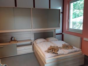 Postel nebo postele na pokoji v ubytování ALL SEASONS - HOSTEL