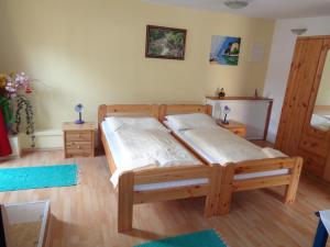 Postel nebo postele na pokoji v ubytování Pension Himmelreich