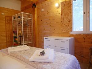 Postel nebo postele na pokoji v ubytování Camping Fiori di Noto