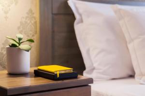 Postel nebo postele na pokoji v ubytování Alexandra Hotel + 37 fotografií