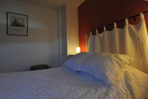 Postel nebo postele na pokoji v ubytování Gite La voie romaine
