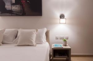 Letto o letti in una camera di Alexandra Hotel