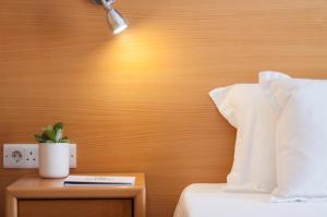 Letto o letti in una camera di Alexandra Hotel