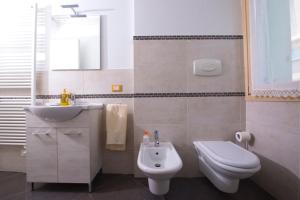 Kúpeľňa v ubytovaní Luxury apartment Garda Lake