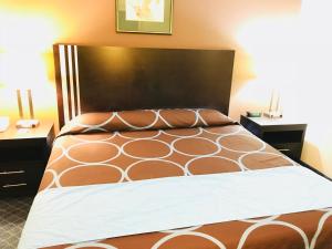Postel nebo postele na pokoji v ubytování BA Hotel