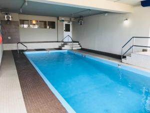 Bazén v ubytování BA Hotel nebo v jeho okolí