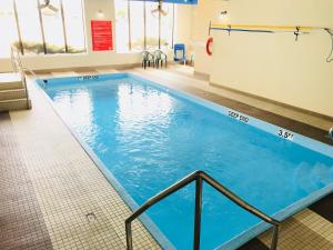 Bazén v ubytování BA Hotel nebo v jeho okolí