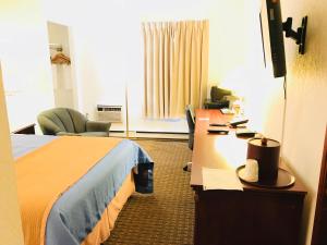 Postel nebo postele na pokoji v ubytování BA Hotel
