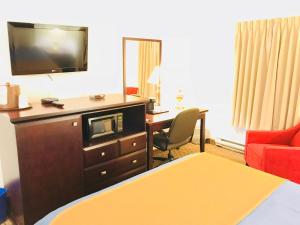 TV a/nebo společenská místnost v ubytování BA Hotel
