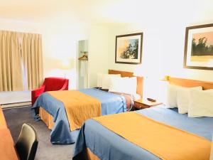 Postel nebo postele na pokoji v ubytování BA Hotel