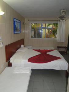 Postel nebo postele na pokoji v ubytování Hotel Nitana