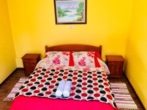Ένα ή περισσότερα κρεβάτια σε δωμάτιο στο Hostal Intipara