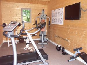 The fitness centre and/or fitness facilities at Hotel Nuit Et Jour - La Maison de Lucile