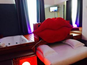 Posteľ alebo postele v izbe v ubytovaní Jacuzzi Rooms