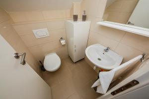 Koupelna v ubytování Apartman Mare + 32 fotografií