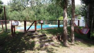 La pileta dentro o cerca de Casabosque Apartamentos 24 fotos más