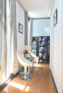A seating area at Hostal Los Arcos