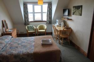Μια τηλεόραση ή/και κέντρο ψυχαγωγίας στο Malin House Hotel