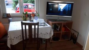 TV a/nebo společenská místnost v ubytování finkeshaus
