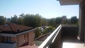 A balcony or terrace at DOMUS MARIS Viserba, Spiagge e Centro a 100 mt, PROMO MAGGIO FIERA MACFRUT, FIERAVICOLA, EXPO DENTAL, MEETING RIMINI