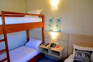 Postel nebo postele na pokoji v ubytování Mandala Hotel + 16 fotografií