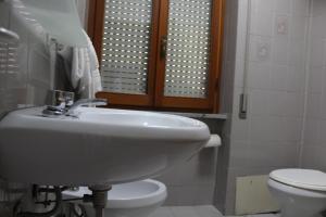 Koupelna v ubytování Hotel Diana