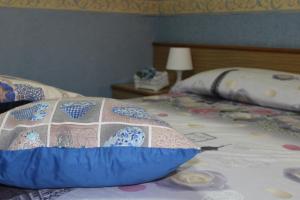 Postel nebo postele na pokoji v ubytování Hotel Diana