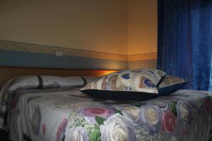 Postel nebo postele na pokoji v ubytování Hotel Diana
