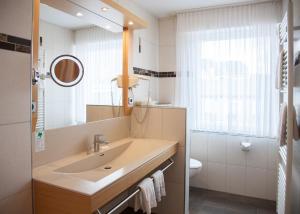 Koupelna v ubytování Hotel Hessenhof