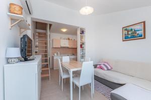 Kuchyň nebo kuchyňský kout v ubytování Apartmani Bego