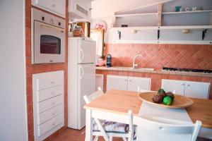 Kuchyňa alebo kuchynka v ubytovaní Ambrosia