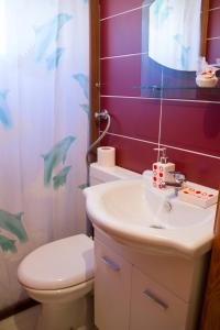 Ένα μπάνιο στο Apartments Lux seaview