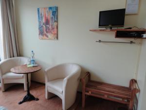 Un televizor și/sau centru de divertisment la B & B Auf dem Wolf, St. Jakob