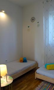 Posteľ alebo postele v izbe v ubytovaní Apartment Pixel