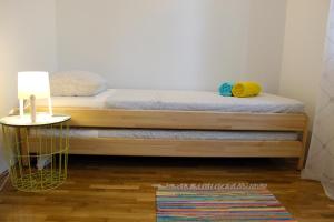 Posteľ alebo postele v izbe v ubytovaní Apartment Pixel